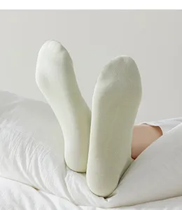 Detail view of avocado green cotton ankle socks, breathable short socks for women everyday wear.