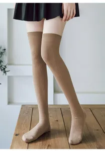 Ribbed knit over the knee long socks in khaki, classic design for cozy autumn wear.