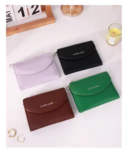 Detailed view of four colorful minimalist small wallets in a lifestyle setting