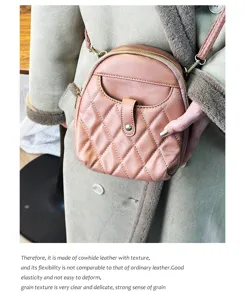 Detailed view of dusty rose quilted cowhide leather mini backpack featuring gold zipper accents