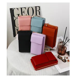 Macro view of minimalist multifunctional crossbody phone bags in various vibrant colors