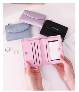 Interior detail of a multi-functional folding wallet showing card slots and colors