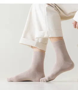 Breathable mesh five toe mid tube socks for men and women, comfortable cotton separate toe design.