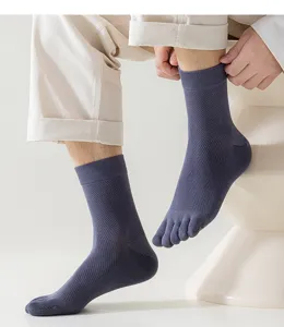 Close-up detail of breathable mesh five-toe mid-calf socks showing toe separation and comfortable fit.