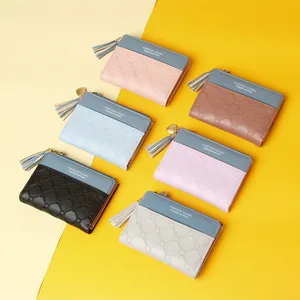 Collection of multi-colored women's short wallets with tassels and heart charms