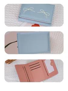 Detail view of tri-fold bowknot wallet showing front, back and pink interior card slots