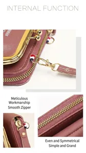 Detailed view of the smooth zipper and gold hardware on a mauve crossbody phone wallet