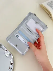 Stylish silver short bi-fold wallet for women with multiple card slots and coin pocket