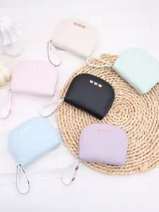 Pastel colored PU leather short wallets with cute cartoon bear pattern and wristlets