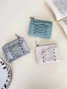 Stylish lace-up bow short wallet for women in Korean ins style, multiple colors.