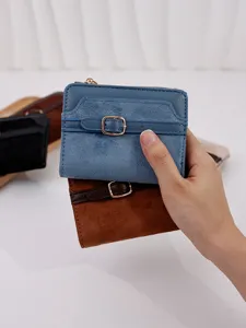 Short patchwork PU leather women's wallet with a decorative buckle and card slots