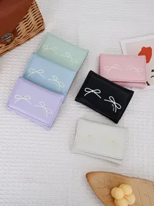 Korean style small bow wallets for women with multi-card slots and pearl detail