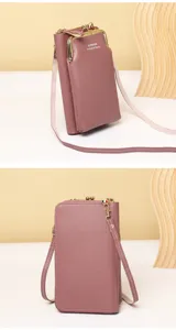 Front and back detail of a dusty rose crossbody phone bag with metal clasp