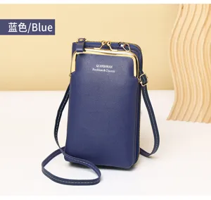 Close-up of the blue vertical crossbody phone bag with functional kiss-lock closure