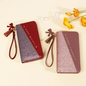 Long zip-around women's wallet with glitter and PU leather contrast design