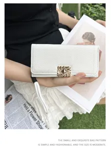 White pebble leather women's long wallet with elegant gold buckle and wrist strap.