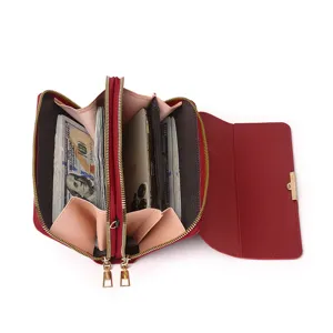 Internal view of red double-zipper wallet with phone and cash compartments
