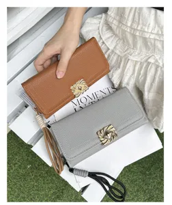 Elegant tri-fold long wallets for women with lychee texture and wristlet strap