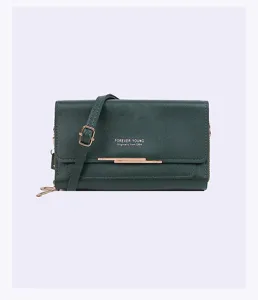 Detailed view of a dark green faux leather crossbody phone bag with gold metal accents.