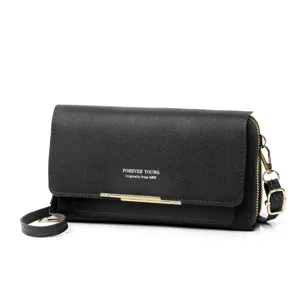 Black crossbody phone bag featuring Forever Young text and elegant gold zipper details.
