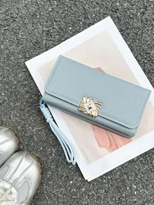Elegant light blue tri-fold wallet for women with gold buckle and wrist strap