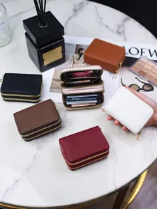 Multicolor lychee pattern double zipper card holders for women on marble table