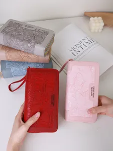 Portafoglio lungo vintage goffrato da donna con doppia cerniera e cinturino
