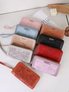 Portafogli lunghi da donna con goffratura floreale retrò e doppia cerniera in vari colori.