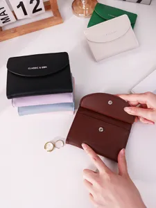 Minimalist multi-color women's wallet and card holder with interior compartment view