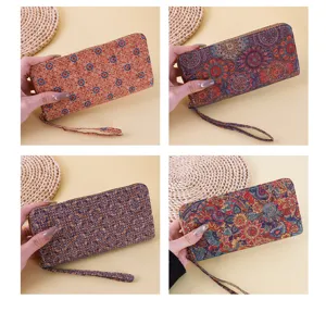 Collection of vintage bohemian floral long wallets with wrist straps and zippers
