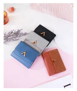 Detailed view of four colorful frosted PU leather tri-fold wallets with metal V-buckle