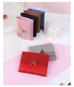Detailed view of multiple colors of short matte PU leather tri-fold women's wallets