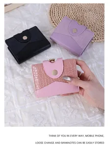 Detailed view of elegant crocodile pattern short wallets for women in multiple colors