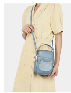 Detailed view of the cute light blue cartoon bear mini crossbody phone bag for women