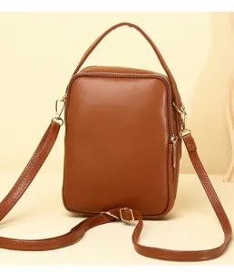 Rear view of stylish brown mini crossbody phone bag showing strap and handle detail