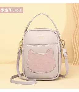 Purple mini crossbody phone bag with cute cartoon cat head design and crocodile texture