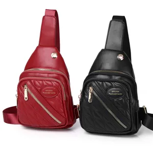 Casual women's quilted sling bags in red and black with multiple zipper compartments