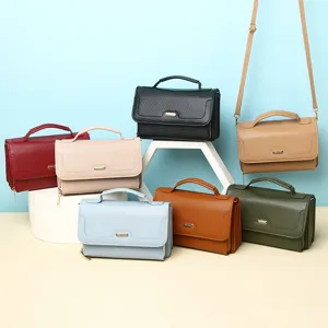 Minimalist solid color women's commuter handbags and crossbody bags in multiple colors