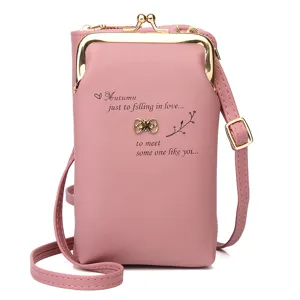 Elegant pink faux leather women's crossbody phone bag with gold clasp and text detail