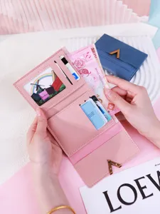 Vintage pink tri-fold women's wallet in matte PU leather with gold V-clasp detail