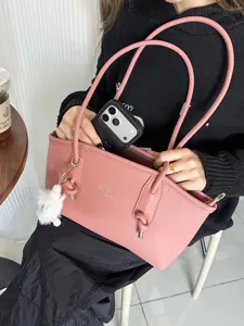 Pink large-capacity PU leather tote bag for commuting with minimalist shoulder straps.