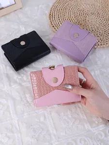 Elegant crocodile pattern short wallet with metal clasp for women