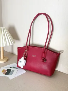 Red PU leather underarm tote bag with large capacity and white fur sheep charm