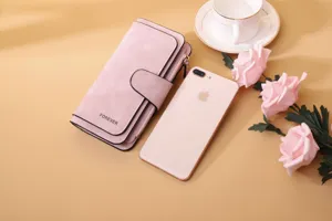 Elegant pink frosted PU leather long wallet for women shown next to a phone and roses