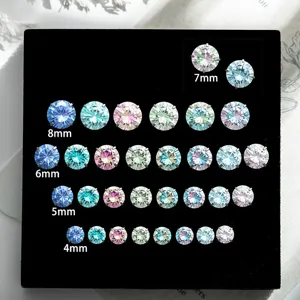 Detailed view of colorful gradient stud earrings in sizes 4mm to 8mm on black display