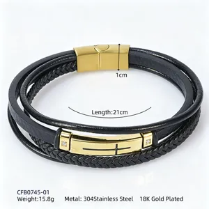 Detail view of men's multi-layer braided leather bracelet with 18K gold plated cross plate