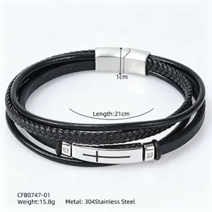 Detail view of men's multi-layer woven leather bracelet with stainless steel cross plate