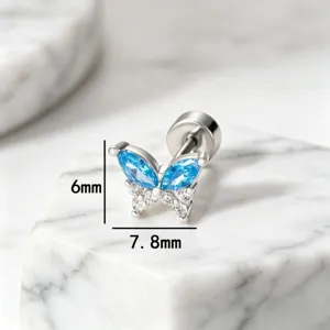 Detailed view of titanium steel butterfly stud earring with blue stones, 7.8mm x 6mm