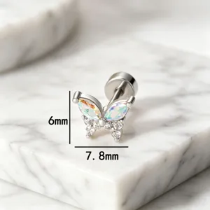 Macro detail of titanium steel butterfly stud earring showing 6mm x 7.8mm dimensions