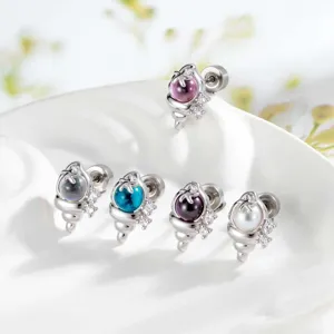 Detailed macro view of colorful ocean series conch stud earrings with shiny zircon